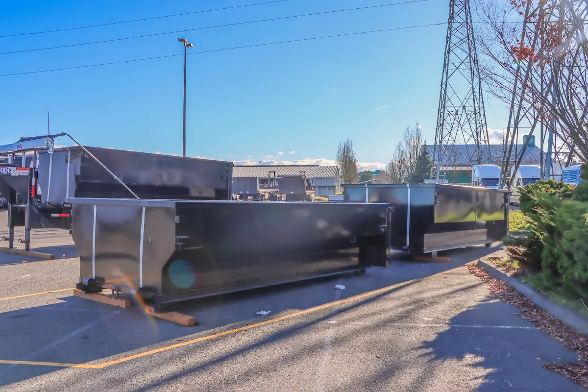 Roll-off dumpster ready for waste disposal at job site for 2 Yard Dumpster Rental in Big Stone Gap